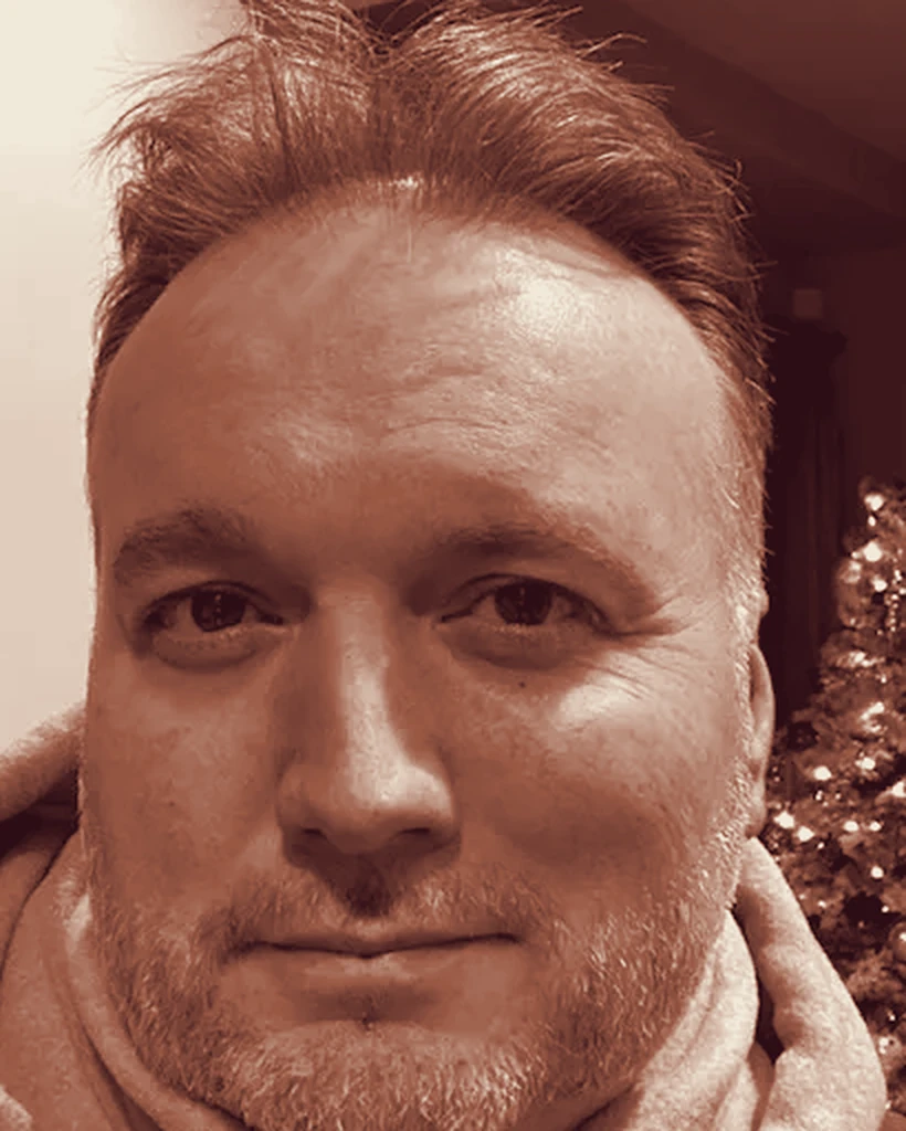 Portrait of Dr. Dustin Wolf, founder and chiropractor